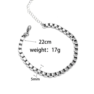 Detail of silver stainless steel box chain bracelet showing 5mm width and lobster clasp