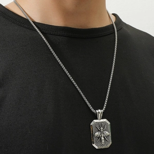 Retro punk bee pendant necklace in silver stainless steel with honeycomb texture
