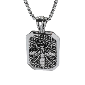 Retro punk bee pendant necklace with honeycomb pattern on a polished silver dog tag chain