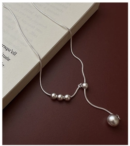 Detail of S925 sterling silver frosted beads and snake chain with engraved hallmark
