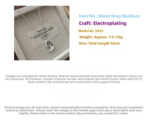 Détail macro du pendentif goutte d'eau en argent S925 avec spécifications de chaîne 56cm