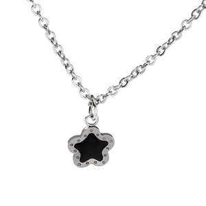 Minimalist hip-hop necklace with a geometric silver star pendant and black enamel inlay