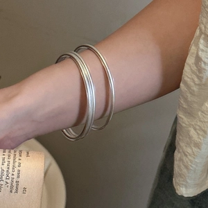 Minimalist S925 sterling silver stacked bangles with a polished finish for women