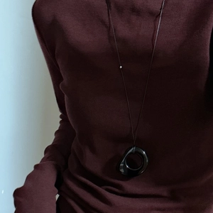 Minimalist S925 silver long necklace with black irregular obsidian pendant on a model