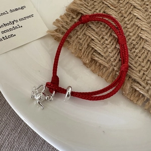 Red braided rope bracelet with S925 silver teapot charm and adjustable knot design