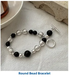 Detail of S925 silver beaded bracelet with black agate beads and vintage OT buckle closure