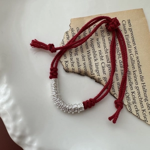 Minimalist S925 sterling silver red cord bracelet with hammered metal rings and tassels