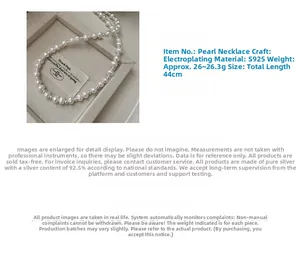 Macro shot of S925 silver beads and natural pearls on an OT buckle choker necklace