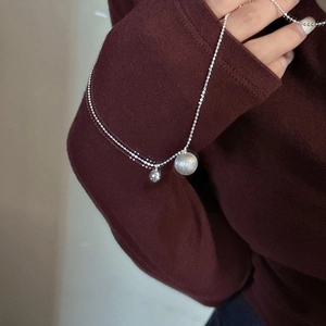 Minimalist S925 silver necklace with frosted large sphere and polished small bead pendants