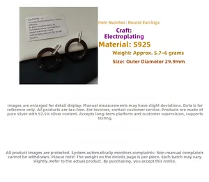 Detail of S925 sterling silver hoop earrings with dark brown tortoiseshell resin texture