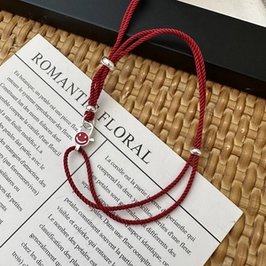 Handcrafted red string bracelet with S925 silver beads and red enamel smiley face charm