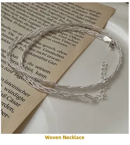 Detailed view of S925 sterling silver braided necklace with hallmarked lobster clasp