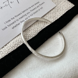 Minimalist S925 sterling silver open bangle with irregular matte hammered texture