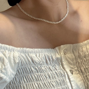 Elegant S925 sterling silver woven lace necklace on neck with polished metallic finish
