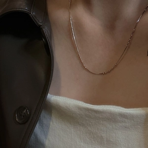 S925 sterling silver minimalist snake chain necklace with beads on a model
