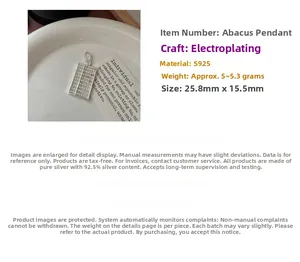 Détail macro du pendentif abaque en argent S925 montrant la taille 25,8mm et le poids