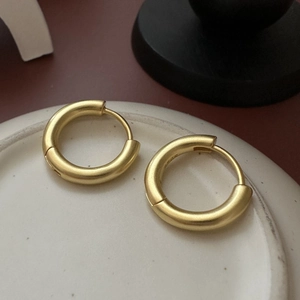 Classic matte gold S925 sterling silver hoop earrings with a minimalist round design