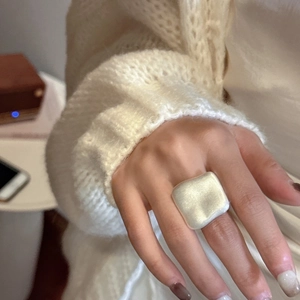 Minimalist S925 sterling silver ring with a large matte square surface on a finger