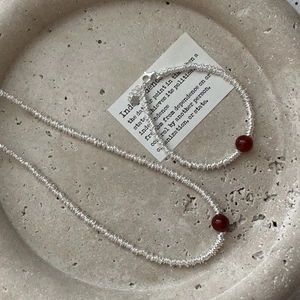 Minimalist S925 sterling silver jewelry set featuring red agate beads and spiral metalwork