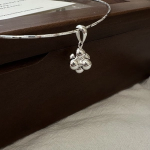 Minimalist S925 sterling silver necklace with faceted shiny ball pendant on wood box