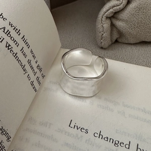 Minimalist S925 sterling silver wide open ring with wavy texture on vintage book page