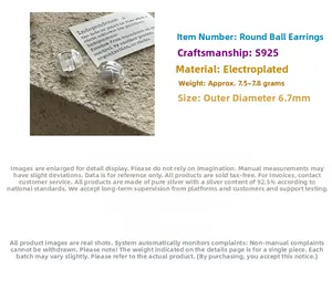 Macro detail of S925 silver ball earrings featuring intricate woven texture and brushed finish