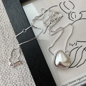 Minimalist S925 sterling silver necklace with matte heart pendant on an elegant box chain