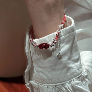 S925 sterling silver red string bracelet with silver beads and red ingot charm on wrist