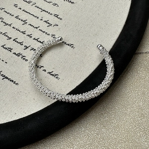 S925 sterling silver woven cuff bracelet with minimalist twisted texture and ball ends