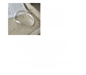 Close-up of S925 plated silver bangle with brushed matte texture and wavy design