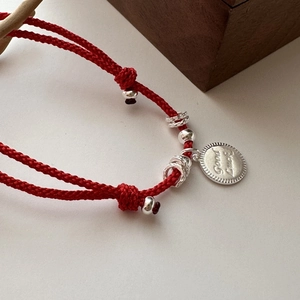 Handmade S925 sterling silver red cord bracelet with a Good Luck engraved charm