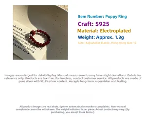 Detail of S925 silver beaded ring with red agate beads and elastic cord adjustment