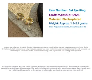 Detail view of elastic S925 silver cat-eye beaded rings with gold and silver plating