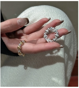 Detailed shot of 925 sterling silver beaded rings with textured CNC pattern beads