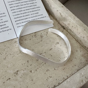 S925 sterling silver minimalist open bangle with a matte brushed wave texture finish