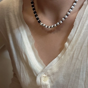 Minimalist S925 sterling silver necklace with black and spiral textured silver beads