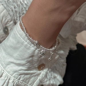 Minimalist S925 sterling silver beaded bracelet featuring cute puppy and bone charms