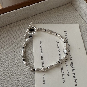 Minimalist S925 sterling silver beaded bracelet with OT toggle clasp on vintage card