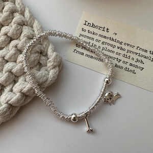S925 sterling silver puppy bracelet with bone charm and elastic beaded design