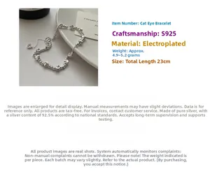 Macro detail of S925 sterling silver beaded bracelet with polished cat eye beads