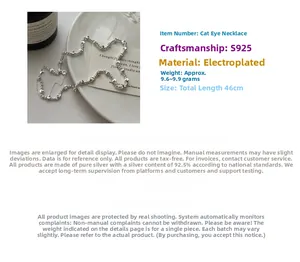 Macro detail of 925 sterling silver cat-eye bead necklace with 46cm length and 9.6g weight