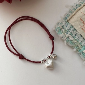 Minimalist S925 sterling silver heart and bell red cord bracelet with adjustable closure