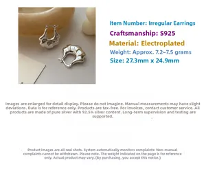 Macro shot of irregular S925 sterling silver hoop earrings with polished metal texture