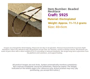 Detail view of S925 silver beaded necklace featuring Maillard tiger eye stone beads