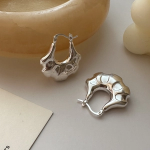 S925 sterling silver hoop earrings with irregular lava texture and polished liquid metal finish