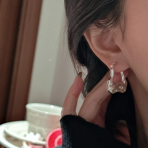 Minimalist S925 sterling silver liquid metal hoop earrings with irregular melted texture
