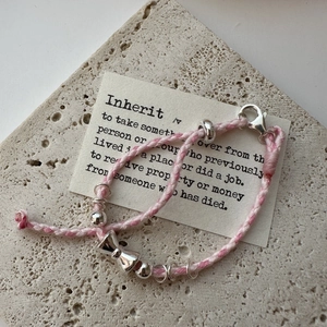Bracelet tressé rose et blanc en argent S925 avec pendentif nœud délicat sur socle pierre