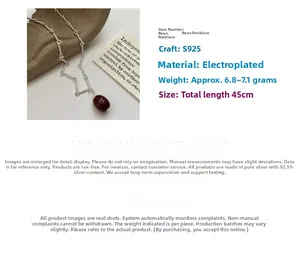 Detailed view of S925 sterling silver chain with red bean pendant and 45cm size specs