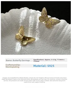 Macro view of gold plated S925 sterling silver butterfly earrings with white zircon