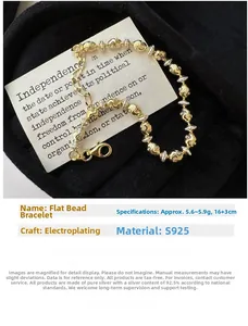 Detailed macro of S925 sterling silver beaded bracelet with wavy two-tone metal textures